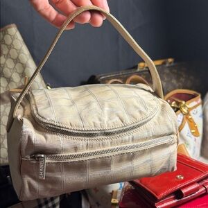 CHANEL Beige Crocodile-Embossed Cosmetic Bag